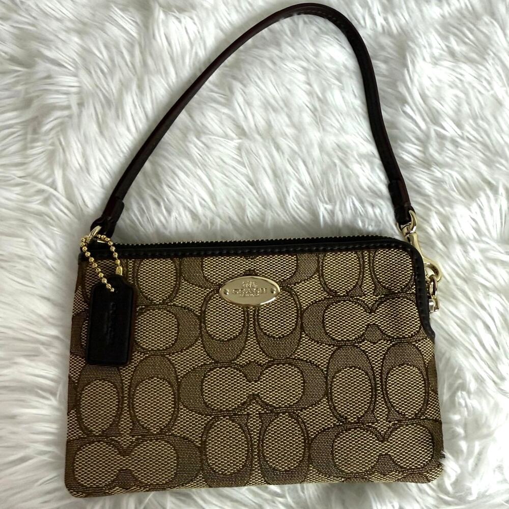 COACH Brown Signature Canvas Wristlet